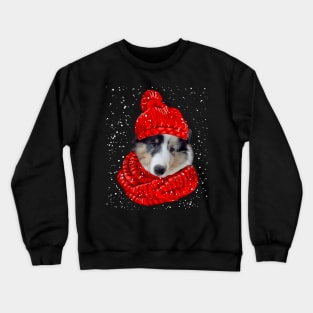 Sheltie Wearing Red Hat And Scarf In Snow Christmas Crewneck Sweatshirt